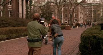 Crimes and Misdemeanors_Cliff films Lester on campus