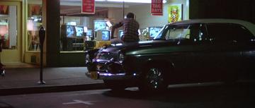 American Graffiti_Curt watches TV before meeting the Pharoahs