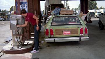 National Lampoons Vacation_Clark fills up the family truckster with gas