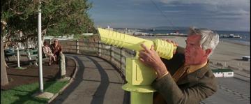 Point Blank_Walker uses the telescope to spy