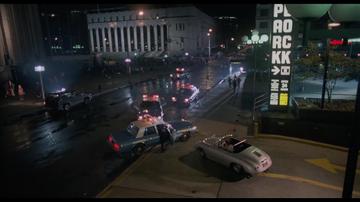 Highlander_MacLeod is cornered outside the car park